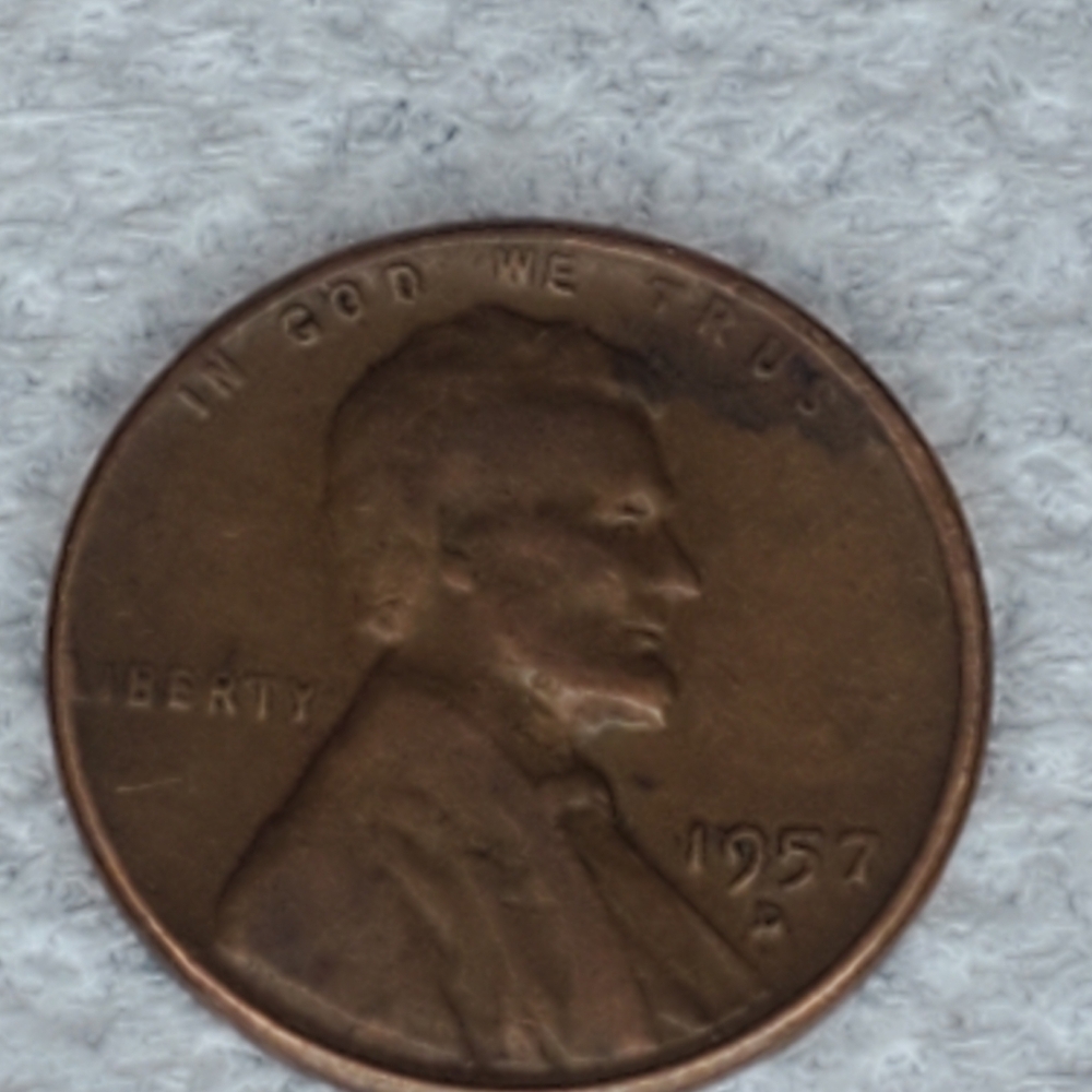 Vintage 1957 D Penny (L) error wheat